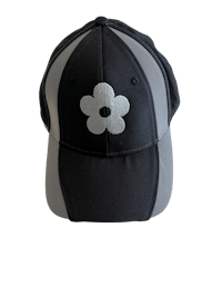 a black hat with a white flower on it